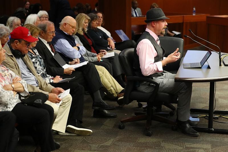 Bartow County Election Supervisor Joseph Kirk, right, addresses Georgia senators Monday as they hear from the public and county election directors about their concerns with a voting bill that increases police powers and ballot inspections. Curtis Compton / Curtis.Compton@ajc.com