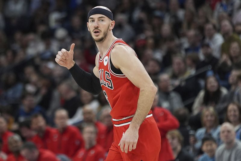 FILE - Chicago Bulls guard Alex Caruso gestures after making a 3-point shot during the first half of an NBA basketball game against the Minnesota Timberwolves, March 31, 2024, in Minneapolis. Josh Giddey has been traded from Oklahoma City to Chicago for Caruso, a person familiar with the situation said. (AP Photo/Abbie Parr, file)