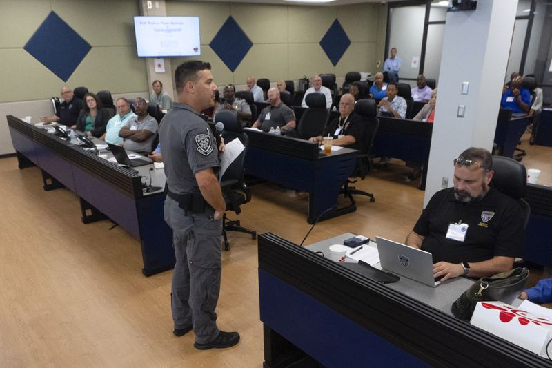 Lt. Shaun Gorski with the Cobb County Sheriff's Department, speaks during an election security training session at Cobb County Emergency Management headquarters, Aug. 23, 2024, in Marietta, Ga. (AP Photo/John Bazemore)