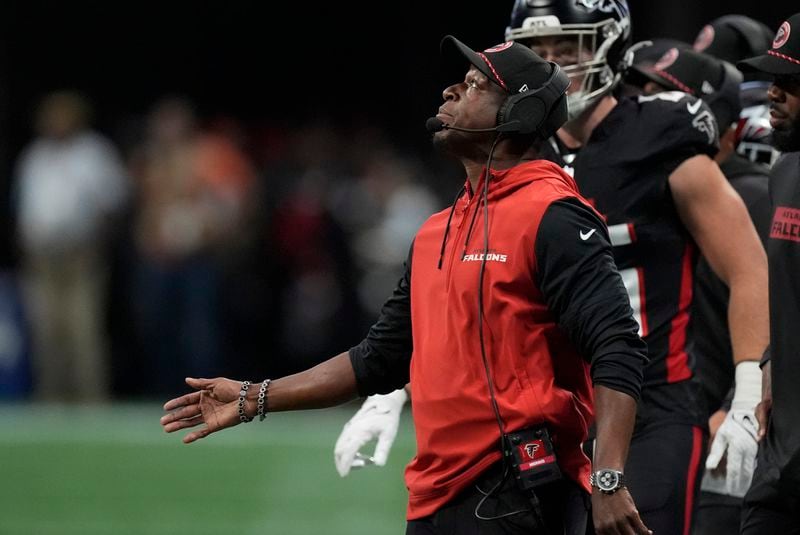 Atlanta Falcons head coach Raheem Morris looks up during the first half of an NFL football game against the Pittsburgh Steelers on Sunday, Sept. 8, 2024, in Atlanta. (AP Photo/John Bazemore)