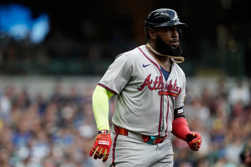 Atlanta Braves' Marcell Ozuna jogs to first after hitting an RBI single during the third inning of a baseball game against the Milwaukee Brewers, Tuesday, July 30, 2024, in Milwaukee. (AP Photo/Aaron Gash)