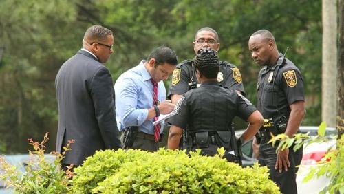 DeKalb County police are investigating a fatal shooting this morning at an apartment complex near I-20. JOHN SPINK/JSPINK@AJC.COM