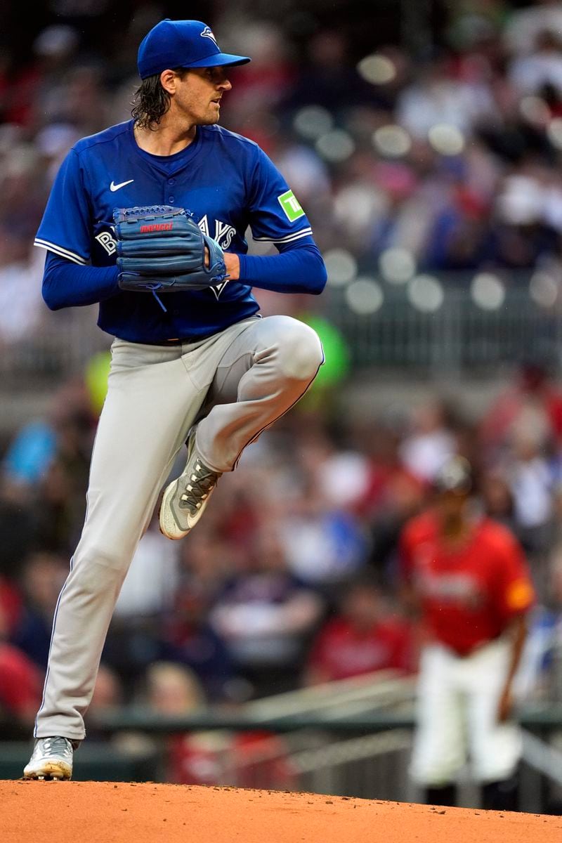 Toronto Blue Jays starting pitcher Kevin Gausman delivers in the first inning of a baseball game against the Atlanta Braves Friday, Sept. 6, 2024, in Atlanta. (AP Photo/John Bazemore)