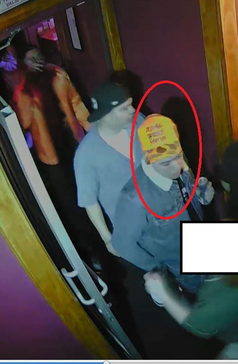 The shooting suspect is seen on security footage at the nightclub complex in Buckhead that includes Red Martini Lounge, Moondog's and Hole in the Wall. 