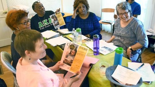 Members of the DeKalb Remembrance Committee meet in May to continue planning events that will culminate in the unveiling of lynching markers in Decatur and Lithonia next year. RYON HORNE / RHORNE@AJC.COM