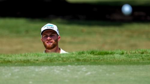 Chris Kirk hits toward the 18th green during a practice round for the Tour Championship at East Lake Golf Club, on Wednesday, Aug. 28, 2024, in Atlanta. (Jason Getz / AJC)
