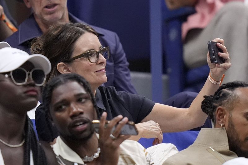 Tina Fey watches the women's singles final of the U.S. Open tennis championships between Aryna Sabalenka, of Belarus, and Jessica Pegula, of the United States, Saturday, Sept. 7, 2024, in New York. (AP Photo/Frank Franklin II)