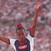 Jackie Joyner-Kersee of the U.S. women's track and field team is airborne for jump #2 in Long jump competition at the Olympic stadium Friday, Aug. 2, 1996, during the 1996 Summer Olympic Games in Atlanta, Georgia. (Karen Waren/AJC)