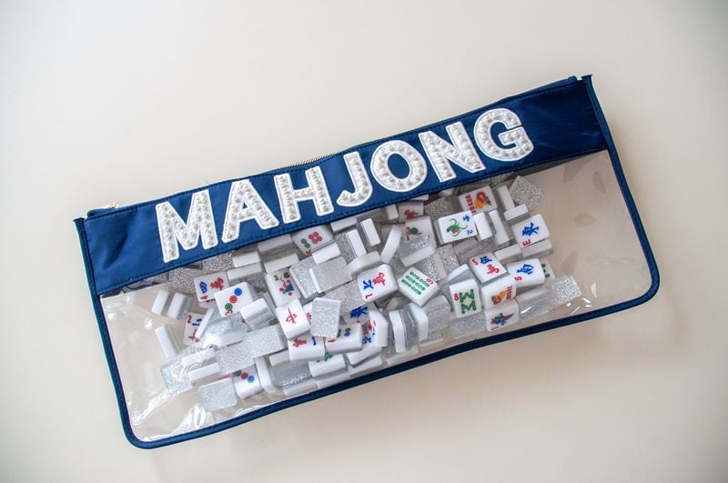 Brands like Oh My Mahjong design stylish mahjong accessories like this tile pouch.  (Courtesy of Swoozie)