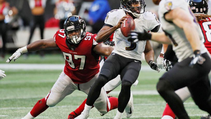 Atlanta Falcons defensive tackle Grady Jarrett (97) works during