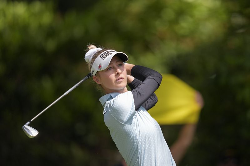 Nelly Korda hits on the fifth tee during the second round of the Women's PGA Championship golf tournament at Sahalee Country Club, Friday, June 21, 2024, in Sammamish, Wash. (AP Photo/Gerald Herbert)