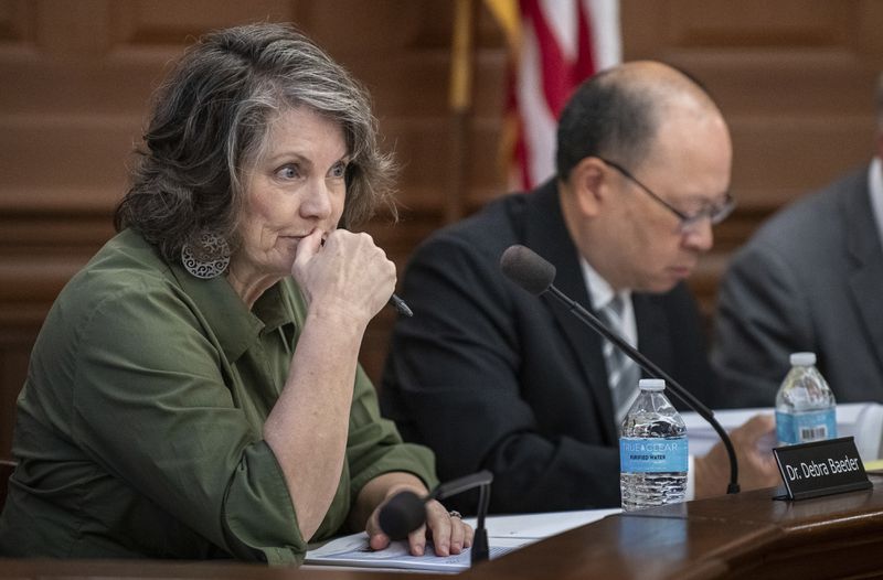 Dr. Debra Baeder, a member of the Independent Commission to Investigate the Facts of the Tragedy in Lewiston listens to Maine State Police Col. William Ross answer a question during a hearing at Lewiston City Hall, Friday, May 24, 2024 in Lewiston, Maine. (Russ Dillingham /Sun Journal via AP)
