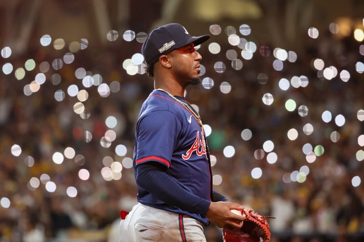 Atlanta Braves’ Ozzie Albies (1) is framed by San Diego Padres fans’ cell phone lights during the ninth inning of National League Division Series Wild Card Game Two at Petco Park in San Diego on Wednesday, Oct. 2, 2024.   (Jason Getz / Jason.Getz@ajc.com)