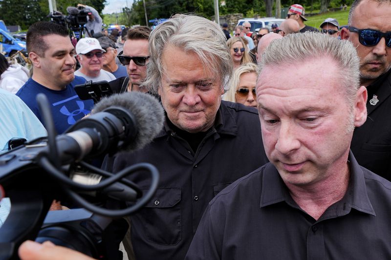 Steve Bannon walks to his car before reporting to Danbury Federal Correctional Institution, Monday, July 1, 2024, in Danbury, Conn. (AP Photo/Julia Nikhinson)