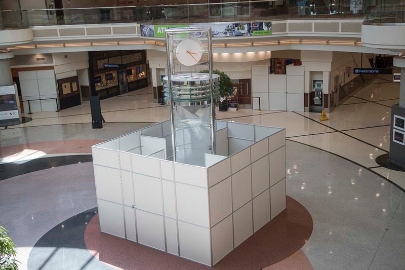 04/14/2020 - Atlanta, Georgia  - A temporary wall is set up in the atrium inside the domestic terminal at Hartsfield-Jackson International Airport in Atlanta, Tuesday, April 14, 2020. (ALYSSA POINTER / ALYSSA.POINTER@AJC.COM)