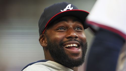 Injured Atlanta Braves’ Michael Harris II talks with a teammate during their game against the San Francisco Giants at Truist Park, Tuesday, July 2, 2024, in Atlanta. The Braves lost to the Giants 5-3. (Jason Getz / AJC)
