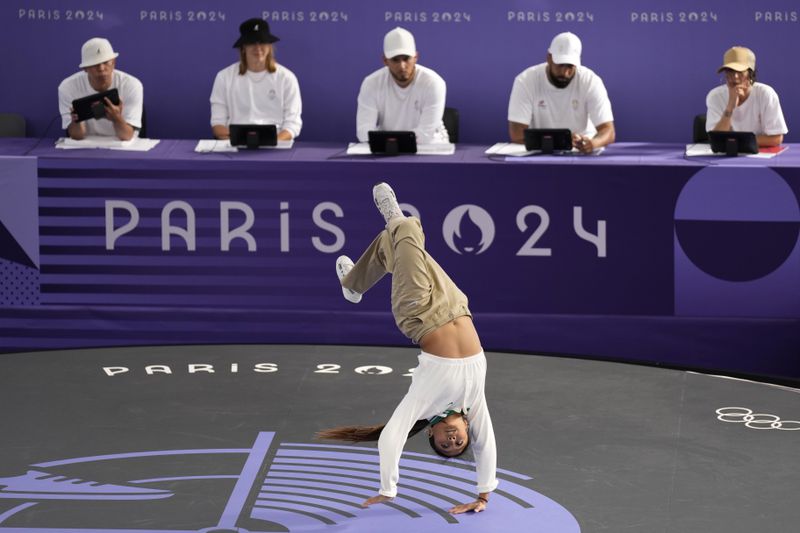 FILE - United States Logan Edra, known as B-Girl Logistx, competes during the Round Robin Battle at the breaking competition at La Concorde Urban Park at the 2024 Summer Olympics, Aug. 9, 2024, in Paris, France. (AP Photo/Abbie Parr, File)