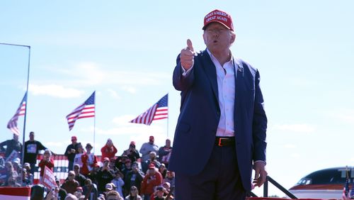 Republican presidential nominee former President Donald Trump gestures as he departs a campaign event at Central Wisconsin Airport, Saturday, Sept. 7, 2024, in Mosinee, Wis. (AP Photo/Alex Brandon)