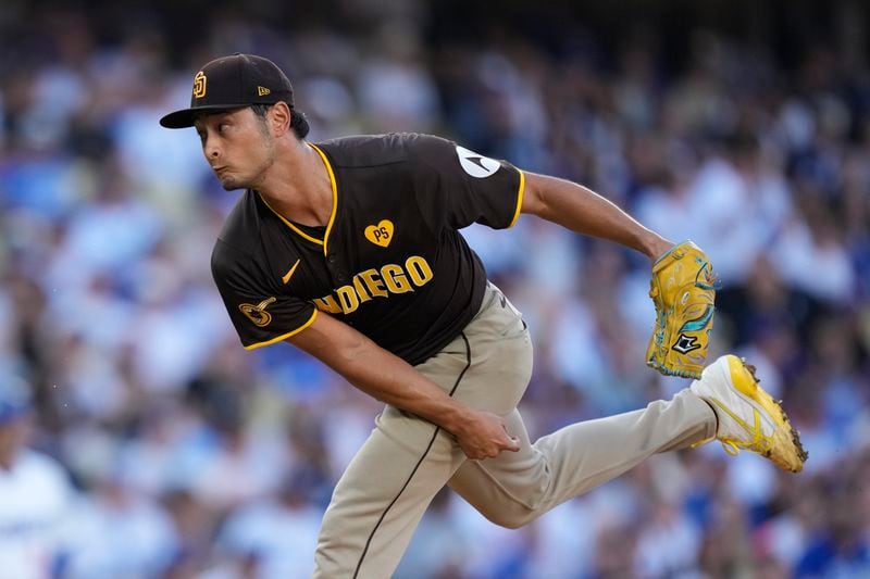 San Diego Padres pitcher Yu Darvish throws to a Los Angeles Dodgers batter during the first inning in Game 2 of a baseball NL Division Series Sunday, Oct. 6, 2024, in Los Angeles. (AP Photo/Mark J. Terrill)