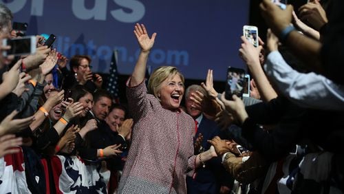 NEW YORK, NY - APRIL 19: Democratic presidential candidate former Secretary of State Hillary Clinton greets supporters during a primary election night gathering on April 19, 2016 in New York City. Hillary Clinton defeated democratic rival U.S. Sen. Bernie Sanders in the New York presidential primary. She appears to be wearing a Georgio Armani jacket that costs $12,495. (Photo by Justin Sullivan/Getty Images)