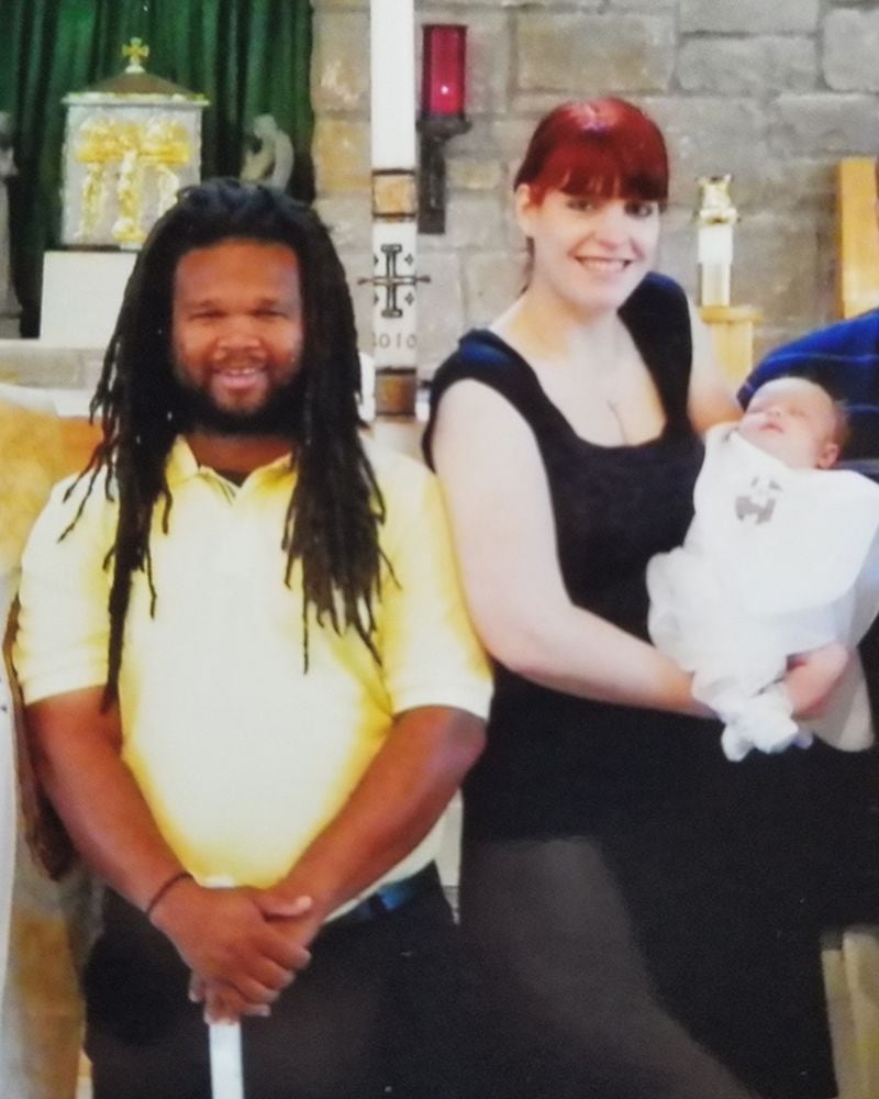 Chris and Michelle Render at the baptism of their daughter Madeline in 2010 in Fayette County. “I’m not going to lie, there are parts of my family that still do not agree" with her interracial marriage, Michelle said. (family photo)