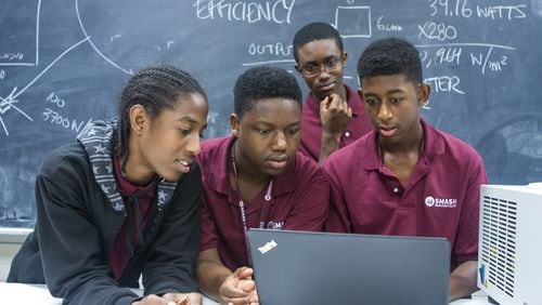 Students work on an assignment in the summer SMASH program at Morehouse College. (HANDOUT PHOTO by Mikki K. Harris)