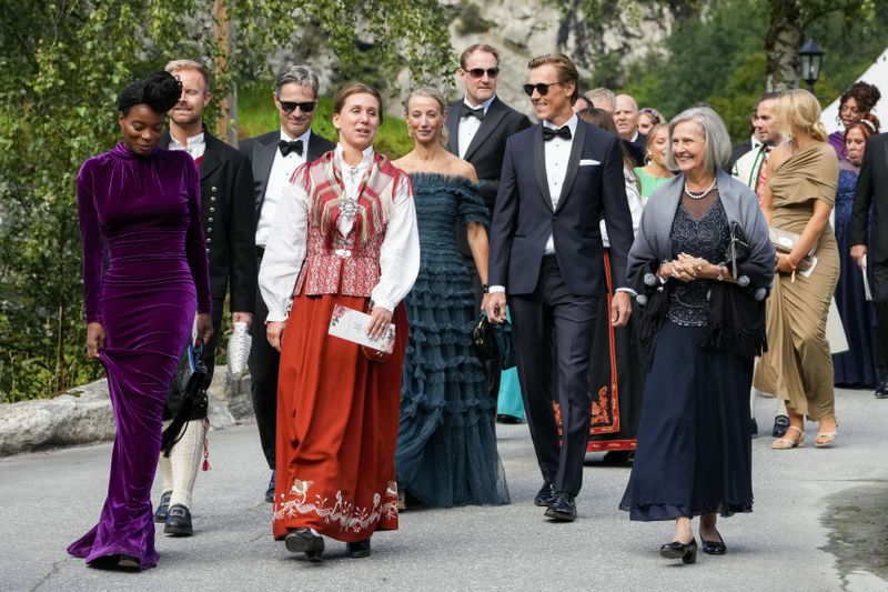 Guests attend the wedding of Norway's Princess Martha Louise and Durek Verrett, in Geiranger, Norway, Saturday Aug. 31, 2024. (Cornelius Poppe/NTB via AP)