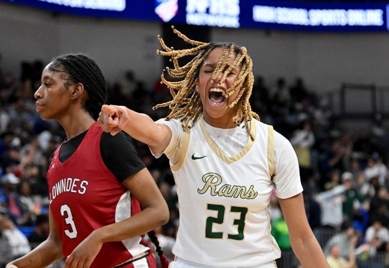Grayson's Erin Rodgers reacts after scoring Saturday during the first half of GHSA Class 7A Semifinal basketball game at GSU’s Convocation Center in Atlanta. Grayson won 66-25 over Lowndes.