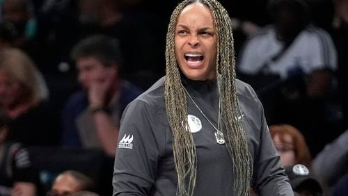 FILE - Chicago Sky coach Teresa Weatherspoon calls out to players during the first half of the team's WNBA basketball game against the New York Liberty, May 23, 2024, in New York. (AP Photo/Frank Franklin II, File)