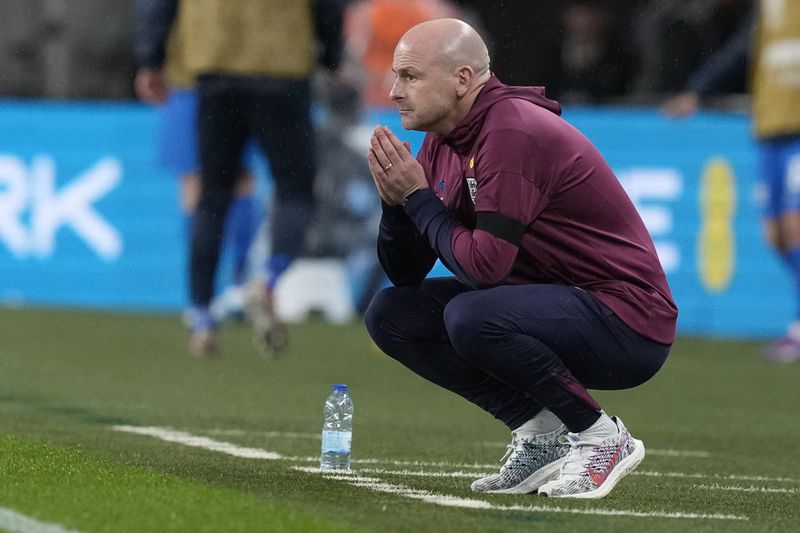 England interim manager Lee Carsley reacts during the Group F UEFA Nations League soccer match between England and Finland at Wembley Stadium in London, Tuesday, Sept. 10, 2024. (AP Photo/Frank Augstein)