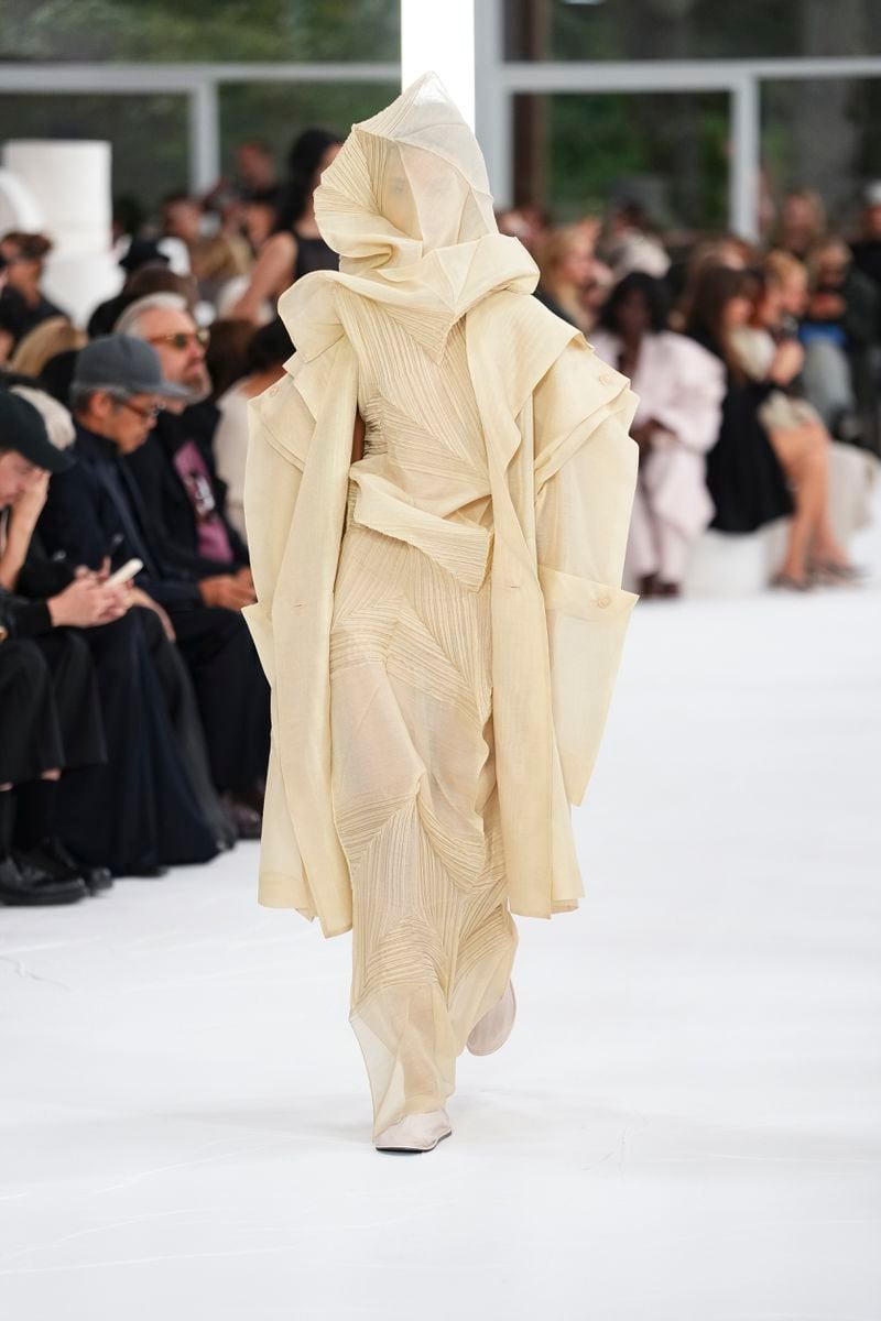 A model wears a creation as part of the Issey Miyake Spring/Summer 2025 collection presented Friday, Sept. 27, 2024 in Paris. (Photo by Scott A Garfitt/Invision/AP)