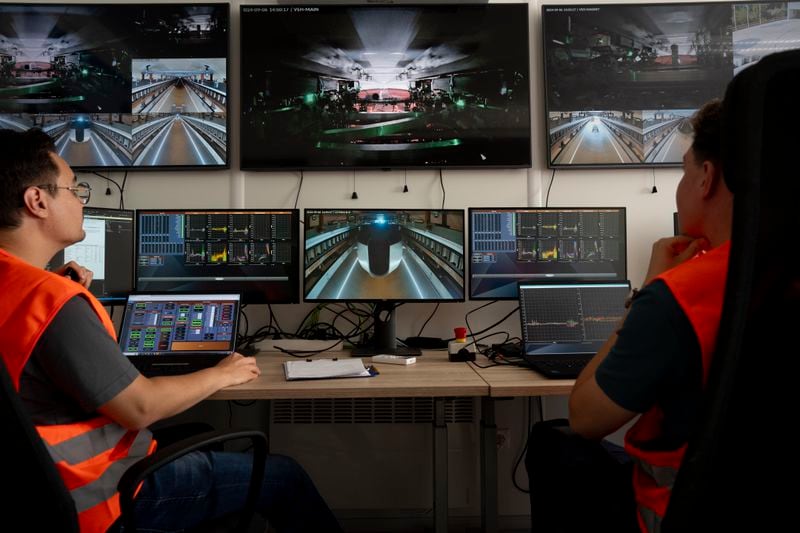 Technicians work in the control room at a testing ground for a high-speed transit system during a press tour of an European test center for hyperloop transportation technology in Veendam, northern Netherlands, Friday, Sept. 6, 2024. (AP Photo/Peter Dejong)