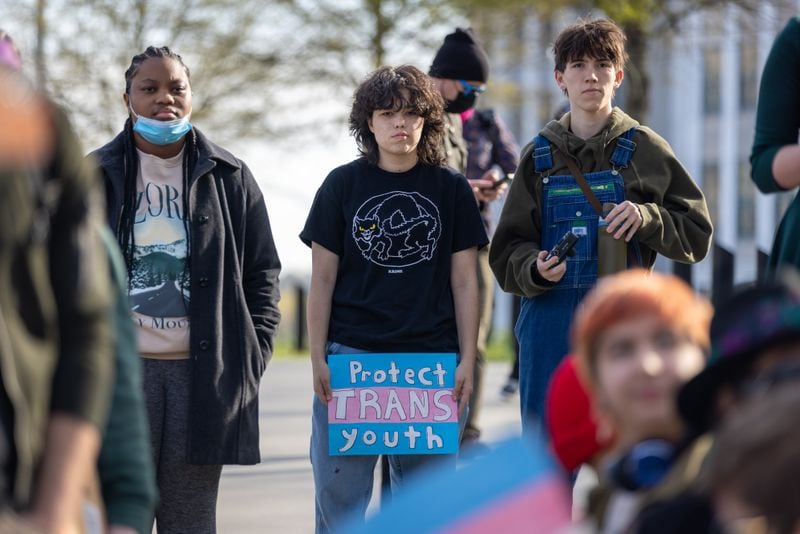 People attend a rally against Senate Bill 140 outside the Capitol in Atlanta on Monday, March 20, 2023. The bill would prevent medical professionals from giving transgender children certain hormones or surgical treatment. (Arvin Temkar/The Atlanta Journal-Constitution)