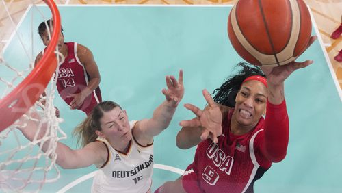 A'ja Wilson (9), of the United States, shoots over Luisa Geiselsoder (15), of Germany, in a women's basketball game at the 2024 Summer Olympics, Sunday, Aug. 4, 2024, in Villeneuve-d'Ascq, France. (AP Photo/Mark J. Terrill, Pool)