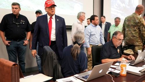 Former President Donald Trump, the Republican presidential nominee, toured damage from Hurricane Helene in Valdosta on Monday. He accused President Joe Biden of being “very nonresponsive” to calls for assistance from Gov. Brian Kemp. But Kemp said at a separate stop in Augusta that he spoke with Biden on Sunday evening and that he appreciated the “bipartisan way” that local, state and federal leaders worked together to respond to the crisis. (Doug Mills/The New York Times via AP, Pool)