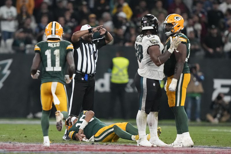 Green Bay Packers quarterback Jordan Love (10) gets hurt during the second half of an NFL football game against the Philadelphia Eagles, Saturday, Sept. 7, 2024, at the Neo Quimica Arena in Sao Paulo. (AP Photo/Doug Benc)