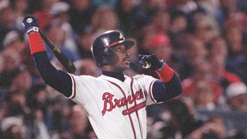 Fred McGriff watches his home run leave the park. (AJC photo/David Tulis) 10/95