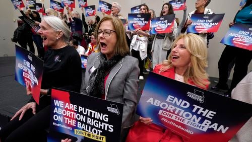 FILE - Missouri residents and pro-choice advocates react to a speaker during Missourians for Constitutionals Freedom kick-off petition drive, Feb. 6, 2024, in Kansas City, Mo. (AP Photo/Ed Zurga, File)