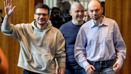 Freed Russian prisoners Ilya Yashin, Andrei Pivovarov and Vladimir Kara-Murza, from left, enter a press conference in Bonn, Germany, Friday, Aug. 2, 2024, a day after they were released as part of a 24-person prisoner swap between Russia and the United States. (AP Photo/Michael Probst)