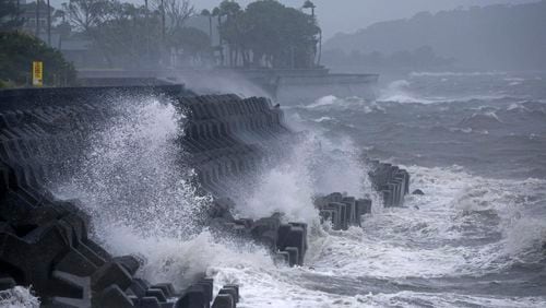 High waves hit a coastal area in Ibusuki, Kagoshima prefecture, western Japan, Wednesday, Aug. 28, 2024, as a typhoon is approaching. (Hidetaka Komukai/Kyodo News via AP)