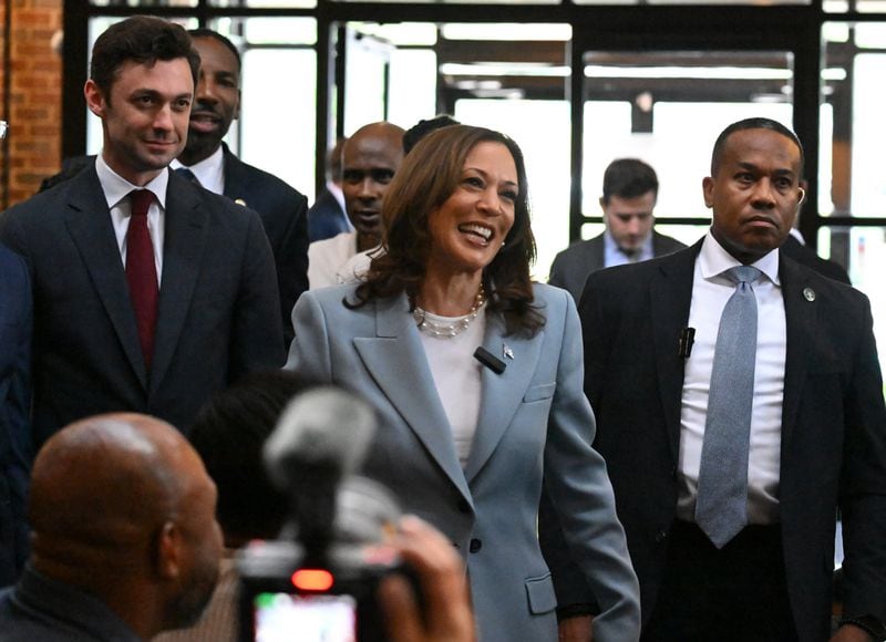 Vice President Kamala Harris makes a brief stop at Paschal's restaurant before heading to a rally in Atlanta on Tuesday. She was accompanied by U.S. Sen. Jon Ossoff, D-Ga., (left) and Atlanta Mayor Andre Dickens (on the left behind Ossoff).