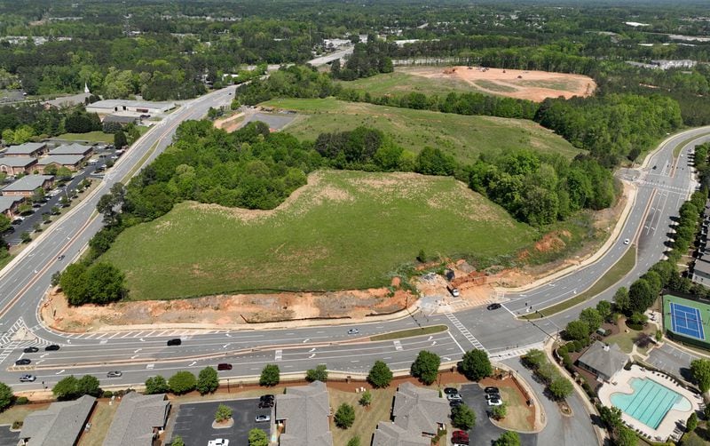 Aerial photograph shows a proposed mixed-use development and arena with the goal of bringing a NHL franchise back to metro Atlanta, along Ga. 400, Tuesday, April 18, 2023, in Alpharetta. The project, called The Gathering at South Forsyth, aims to transform roughly 100 acres along Ga. 400 into an entertainment hub centered around an 18,000-seat arena. (Hyosub Shin / Hyosub.Shin@ajc.com) 