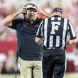 Georgia head coach Kirby Smart runs to a referee to discuss a call during the first half of an NCAA college football game against Alabama, Saturday, Sept. 28, 2024, in Tuscaloosa, Ala. (AP Photo/Vasha Hunt)