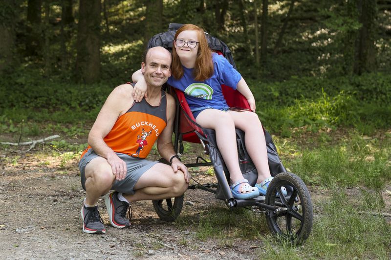 "I feel very, very grateful to have someone with a disability in my life," says David Glass. "Everyone needs a Darden in their life.” (Jason Getz / Jason.Getz@ajc.com)