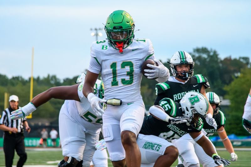 Buford runs the ball in for a touchdown during the Buford at Roswell high school football game in Roswell, Georgia on September 6, 2024. (Jamie Spaar for the Atlanta Journal Constitution)