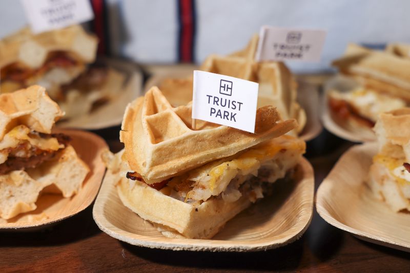 A new food item available are shown including the “The Cleanup Burger” during the Atlanta Braves host Media Day at Truist Park, Tuesday, March 28, 2023, in Atlanta. Jason Getz / Jason.Getz@ajc.com)
