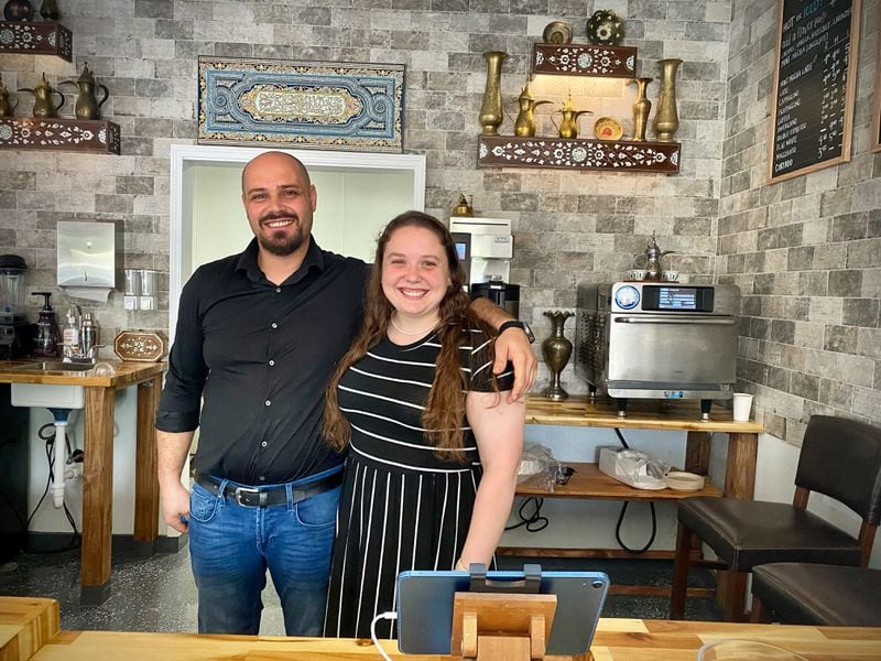 Ahmad (left) and Marianna Alzoukani (right) opened Mint Coffeehouse last week in Tucker. The coffee shop combines Syrian and American culture.