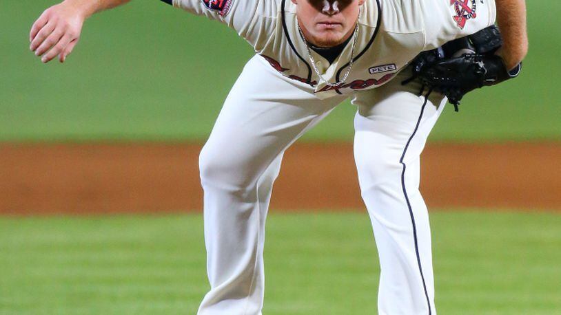 Atlanta Braves Photo (2012) - Craig Kimbrel wearing the Atlanta Braves  alternate red uniform during a game in 2012 season