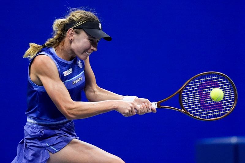 Erika Andreeva, of Russia, returns a shot during a match against Aryna Sabalenka, of Belarus, in the third round of the U.S. Open tennis championships early Saturday, Aug. 31, 2024, in New York. (AP Photo/Julia Nikhinson)