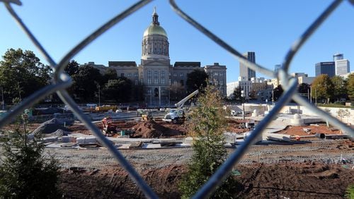 Liberty Plaza, the new park and protest area across from the State Capitol, still has a ways to go as construction workers race to finish before the the Legislative session kicks off at the beginning of 2015. BEN GRAY / BGRAY@AJC.COM